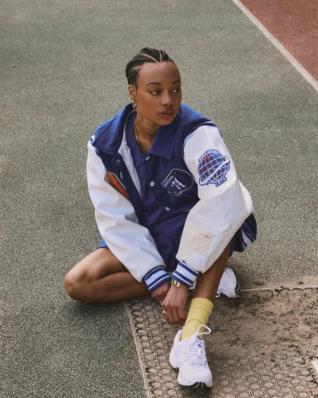 Blouson bleu et blanc de baseball universitaire de Londres pour femme