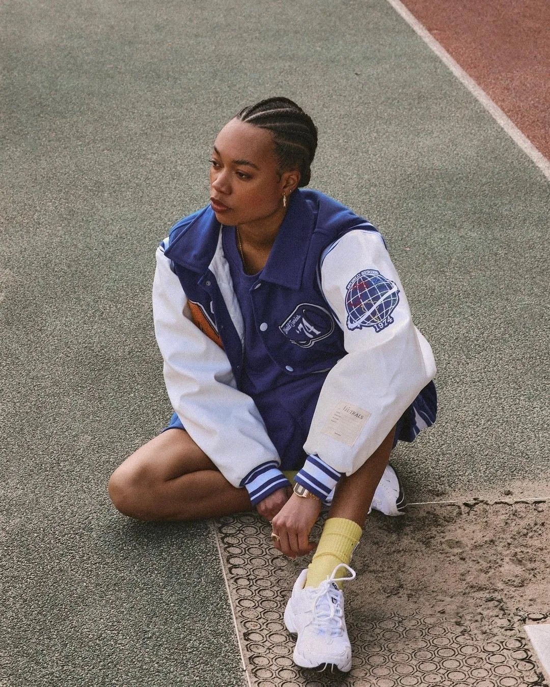 Blouson bleu et blanc de baseball universitaire de Londres pour femme