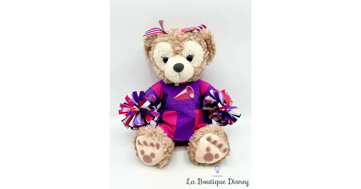 Peluche ShellieMay Pom Pom Girl The Disney Bear Disney Parks 2015 Cheerleader ours violet rose 33 cm