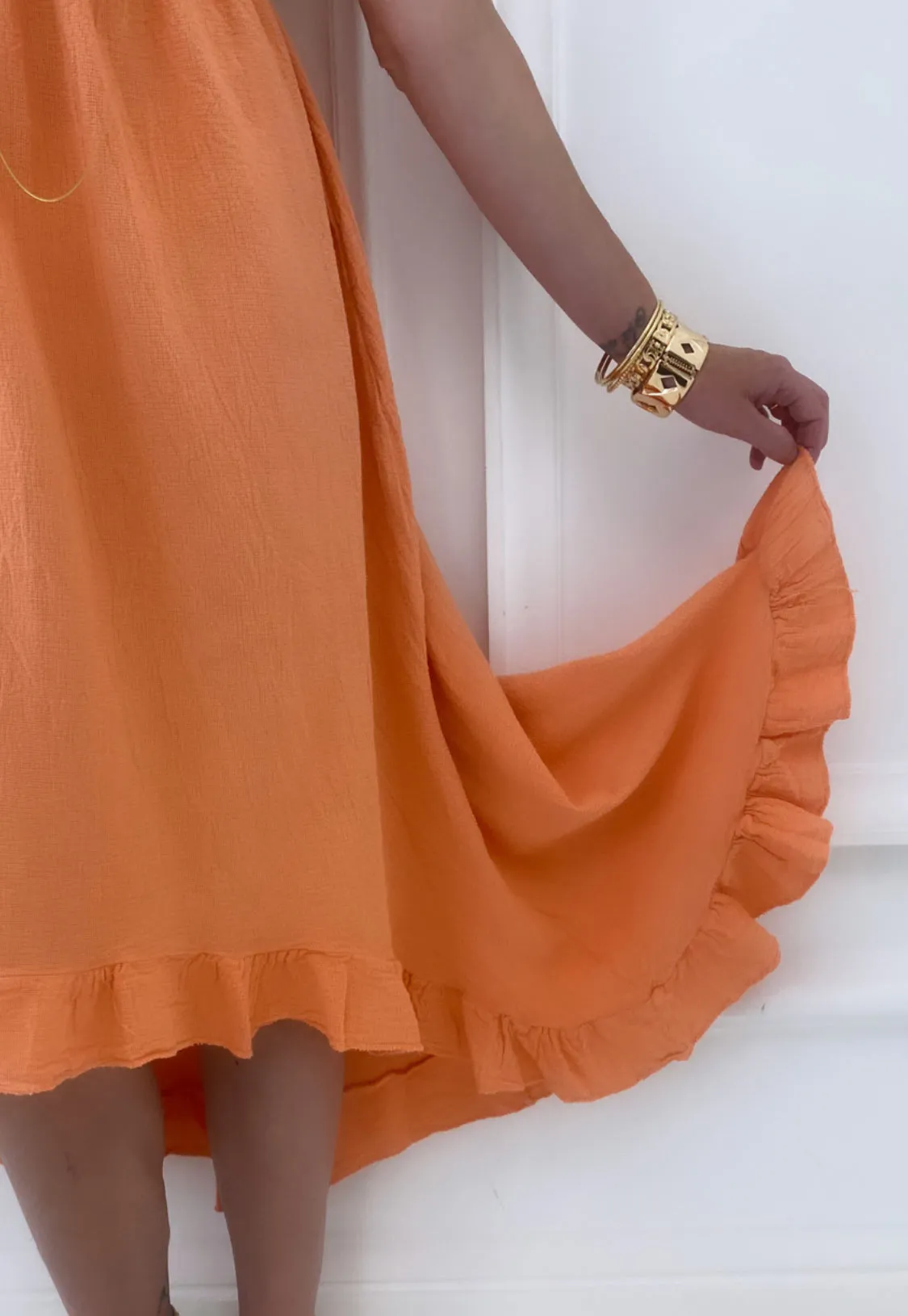 Robe orange asymétrique à volants en coton