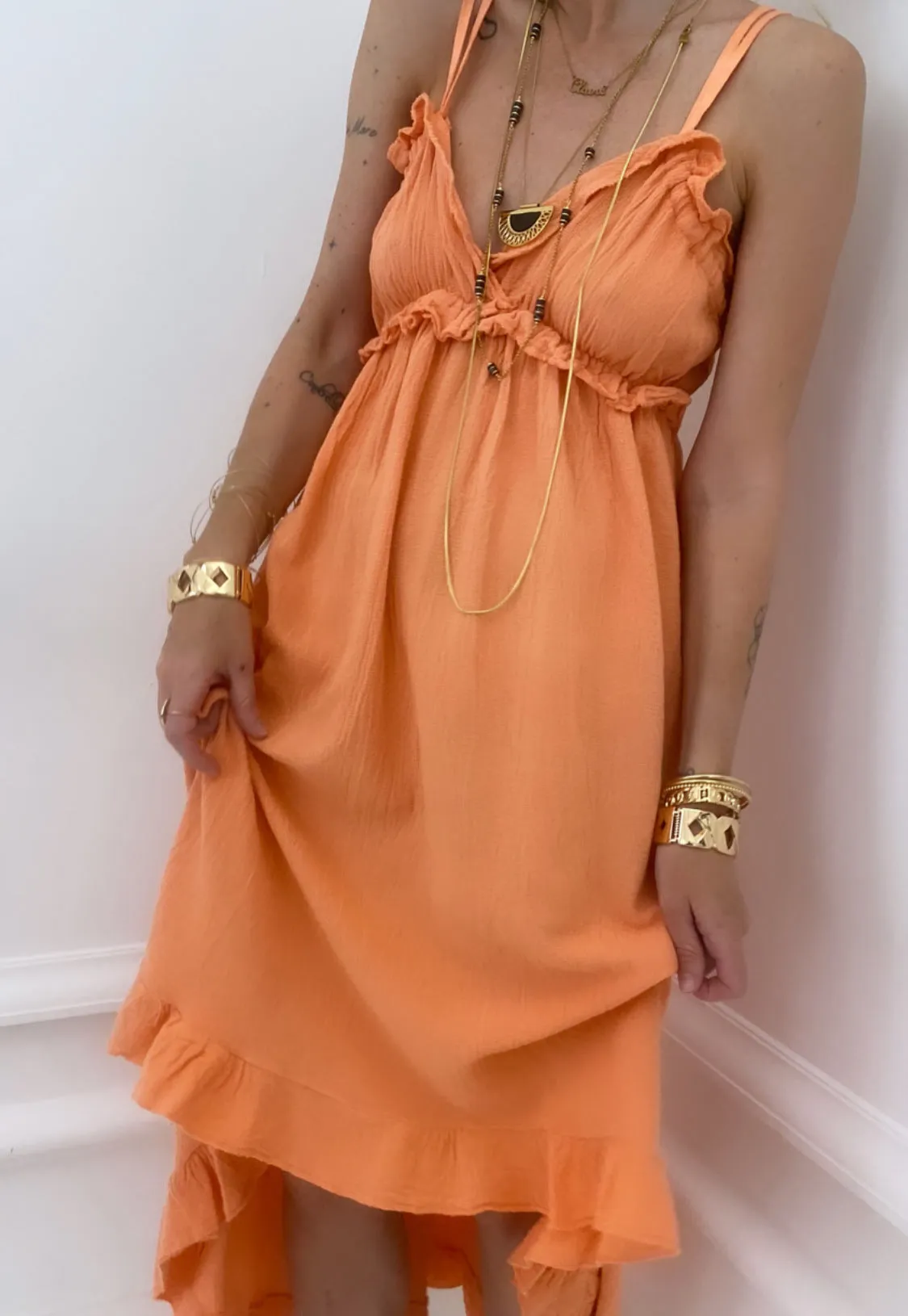 Robe orange asymétrique à volants en coton