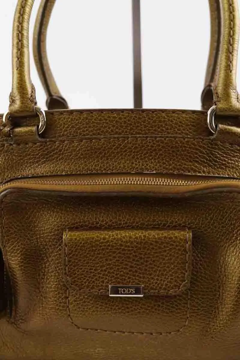 Sac à main en cuir  Tod's doré. Matière principale cuir.