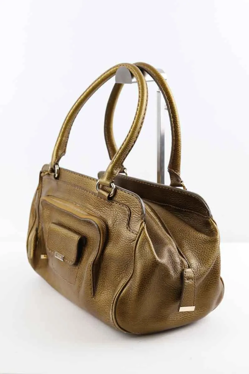 Sac à main en cuir  Tod's doré. Matière principale cuir.