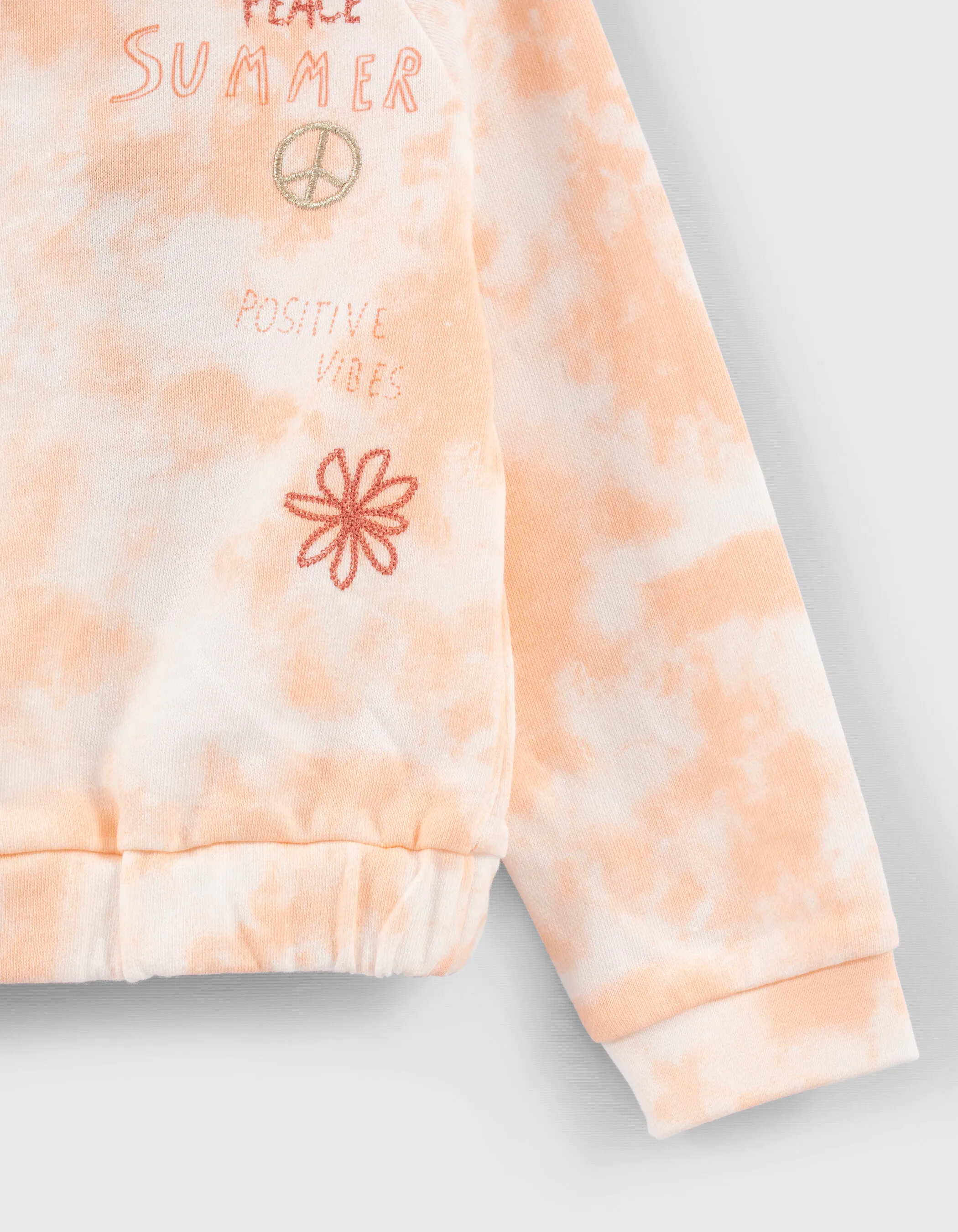 Sweat orangé imprimé tie and dye brodé fille